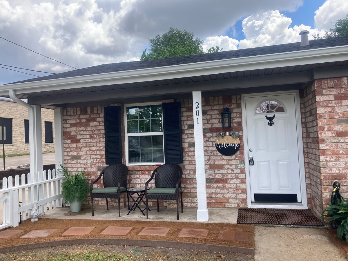 Covered front porch with outdoor chairs